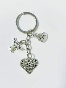 [1 pieza] Llavero vintage de plata con corazón de ángel para mamá, colgante de bolso con corazón de flor hueco, regalo del Día de la Madre para mujeres, colgante para mochila, dije de corazón de flor grabado para mamá, accesorio de bolso con tema familiar cálido, anillo de metal para llaves, soporte portátil anti-pérdida para llaves, decoración diaria para bolso, regalo conmovedor para mamá - Plateado - Ver 7