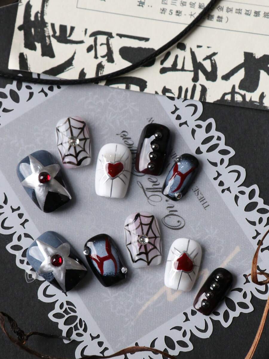 10 Peças Unhas Postiças com Teia de Aranha Escura, Estrela Prateada e Coração Vermelho, Unhas Postiças Feitas à Mão, Kit de Unhas Artificiais Inclui 1 Folha de Abas Adesivas e 1 Lixa Mini - Multicolorido - Visão 1