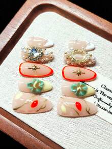 Press-On Fake Nails, Handmade Wearable Nails, Short Almond Shape, Nude With Yellow And White French Tips, Hand-Painted Gold Vine Lines, Orange-Red And Yellow Petals, Handmade 3D Embossed Green Flowers, Hand-Painted Orange-Red Outlines, Gold Starbursts, Oversized Iridescent Heart Rhinestones, Nude Oval Gemstones With Gold Trim, Gold And White Pearl Decorations, Vintage Luxury Style, Gentle And Sweet, Reusable - Multicolor - View 7