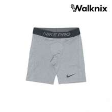 Nike Pantalones cortos elásticos con logo sólido metálico para entrenamiento profesional, color gris - Multicolor - Ver 1