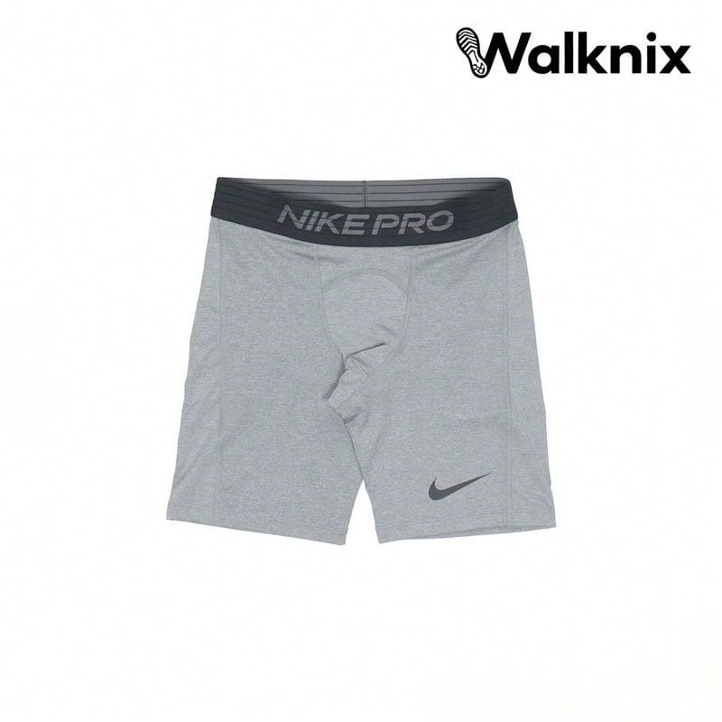 Nike Pantalones cortos elásticos con logo sólido metálico para entrenamiento profesional, color gris - Multicolor - Ver 1