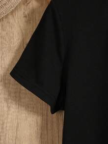 A Double-Sided Printed T-Shirt With A Floral And Sun Design By "Summer Vibe", Featuring A Round Neck And Short Sleeves, Ideal For Wearing In Spring. - Black - View 4