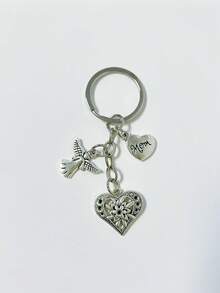 [1 pieza] Llavero vintage de plata con corazón de ángel para mamá, colgante de bolso con corazón de flor hueco, regalo del Día de la Madre para mujeres, colgante para mochila, dije de corazón de flor grabado para mamá, accesorio de bolso con tema familiar cálido, anillo de metal para llaves, soporte portátil anti-pérdida para llaves, decoración diaria para bolso, regalo conmovedor para mamá - Plateado - Ver 6