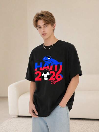 Camiseta de manga corta blanca con estampado de rana azul y texto HAITI 2026 balón de fútbol para uso casual urbano deportivo