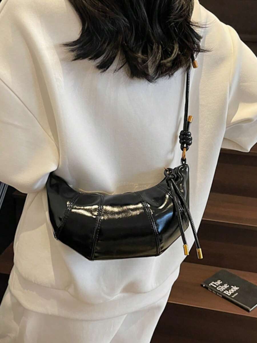 高端號角造型小號麂皮斜挎包，新款時尚吸睛餃子包，百搭腋下單肩包
