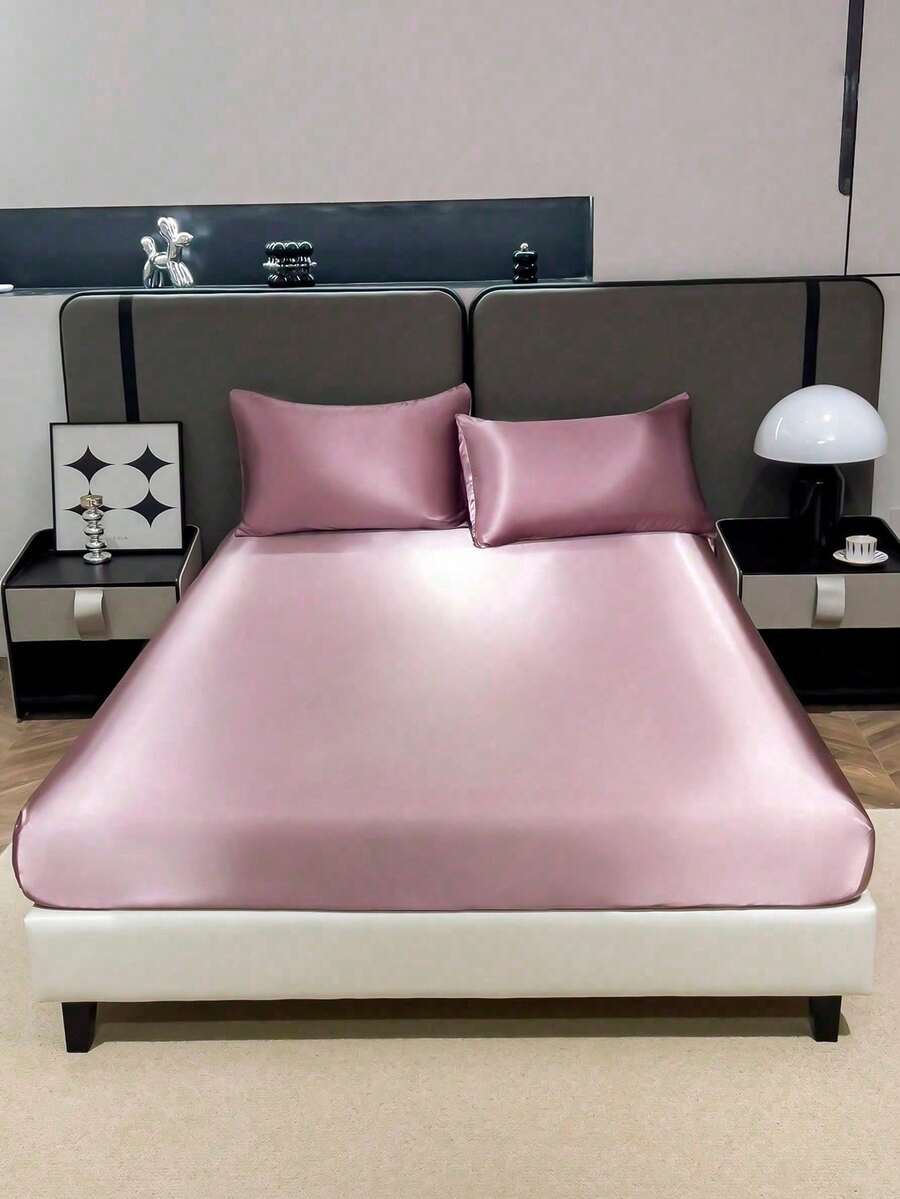 三件套纯色灰粉色缎面床上用品,包含1个床笠和2个枕套(不含枕芯),现代柔软的床上用品套装,适合居家使用,床笠深度为11.8英寸,缎面枕套柔软透气,不易起皱,尽显奢华酒店风范,是送给父母、朋友、宿舍或返校的理想礼物。 - 藕粉色 - 查看 1