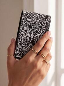 Yves Saint Laurent Compact Mini Red Zebra Print Envelope-Style Storage Bag With Built-In Mirror, Magnetic Closure, Portable And Lightweight, Fits Easily In Handbag, Convenient For Daily Dates, Shopping, Travel And Makeup Touch-Ups, Lipstick Organizer YSL-GIFT-140 - Black - View 9