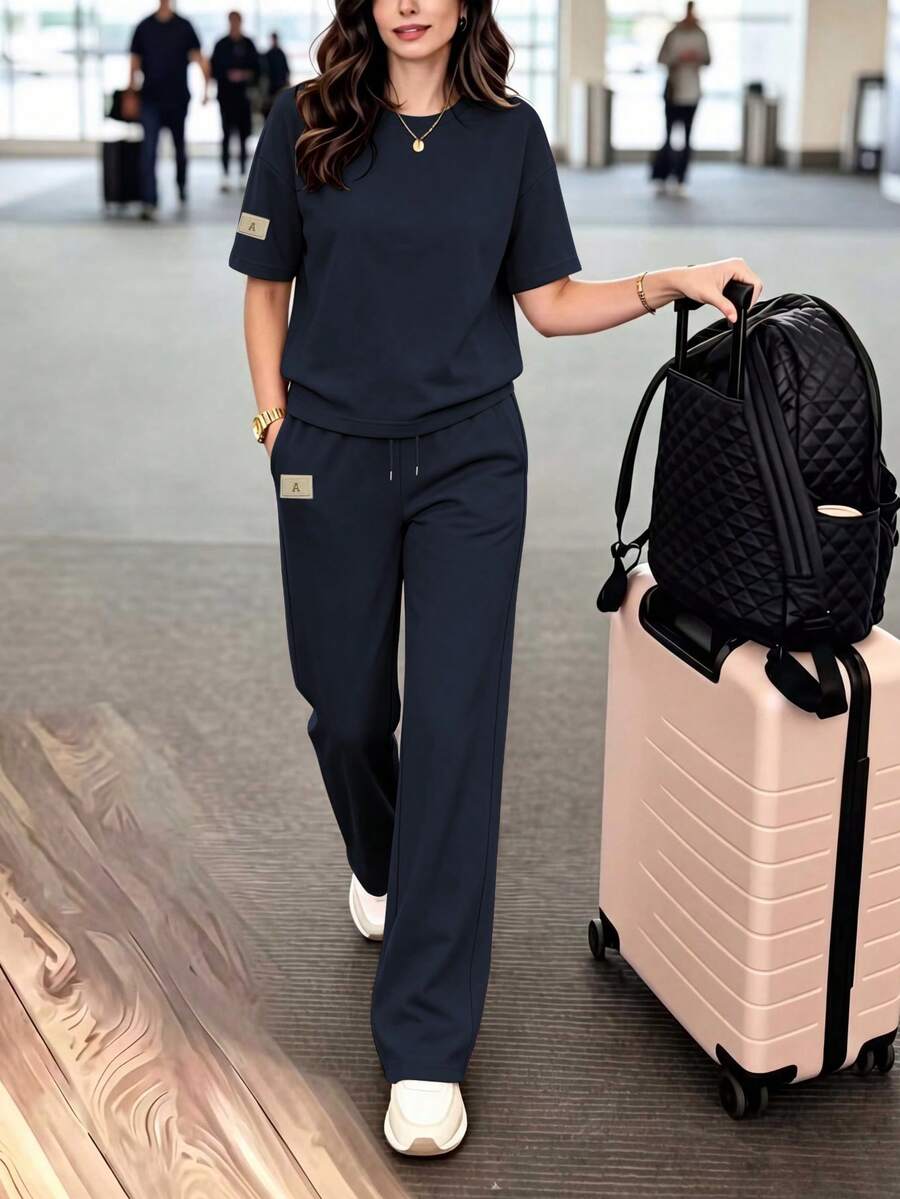 女款休閒兩件套,圓領T恤搭配微彈長褲,舒適居家服套裝,附口袋,優雅夏季款 - 藏青色 - 查看 1