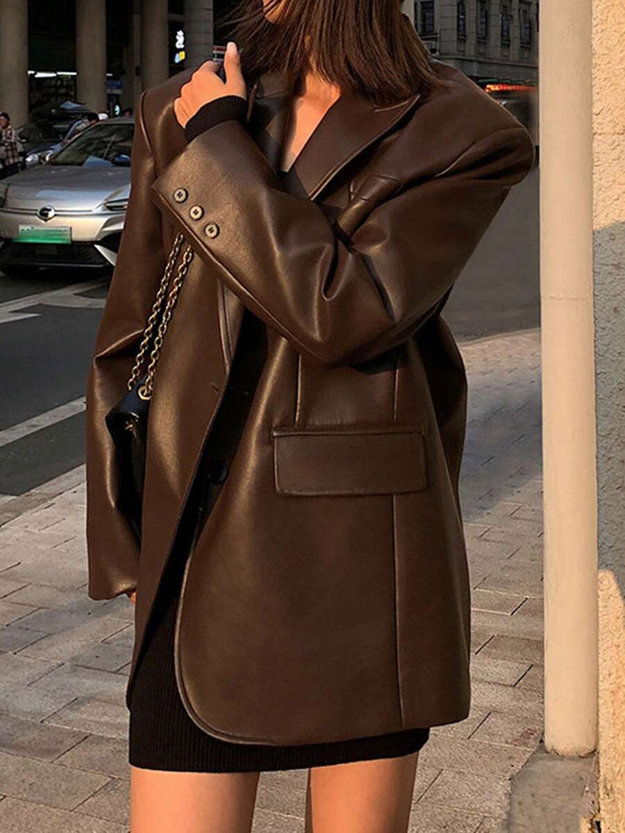 黑色寬鬆復古PU皮革夾克，尖領街頭風女款高端外套，適合派對、演出、婚禮及日常活動，秋冬款