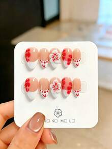 10 piezas de uñas postizas hechas a mano, forma de almendra, estilo suave para la temporada de graduación, base nude transparente con punta francesa degradada en rojo y blanco + contorno de lunares rojos + flor 3D de cinco pétalos degradada en rojo y blanco + cuentas de metal dorado y adorno de strass central, diseño elegante minimalista y femenino que resalta la piel, adecuado para fiestas, bodas y uso diario, incluye herramientas para uñas, regalo perfecto para mujeres y niñas - Rojo - Ver 12