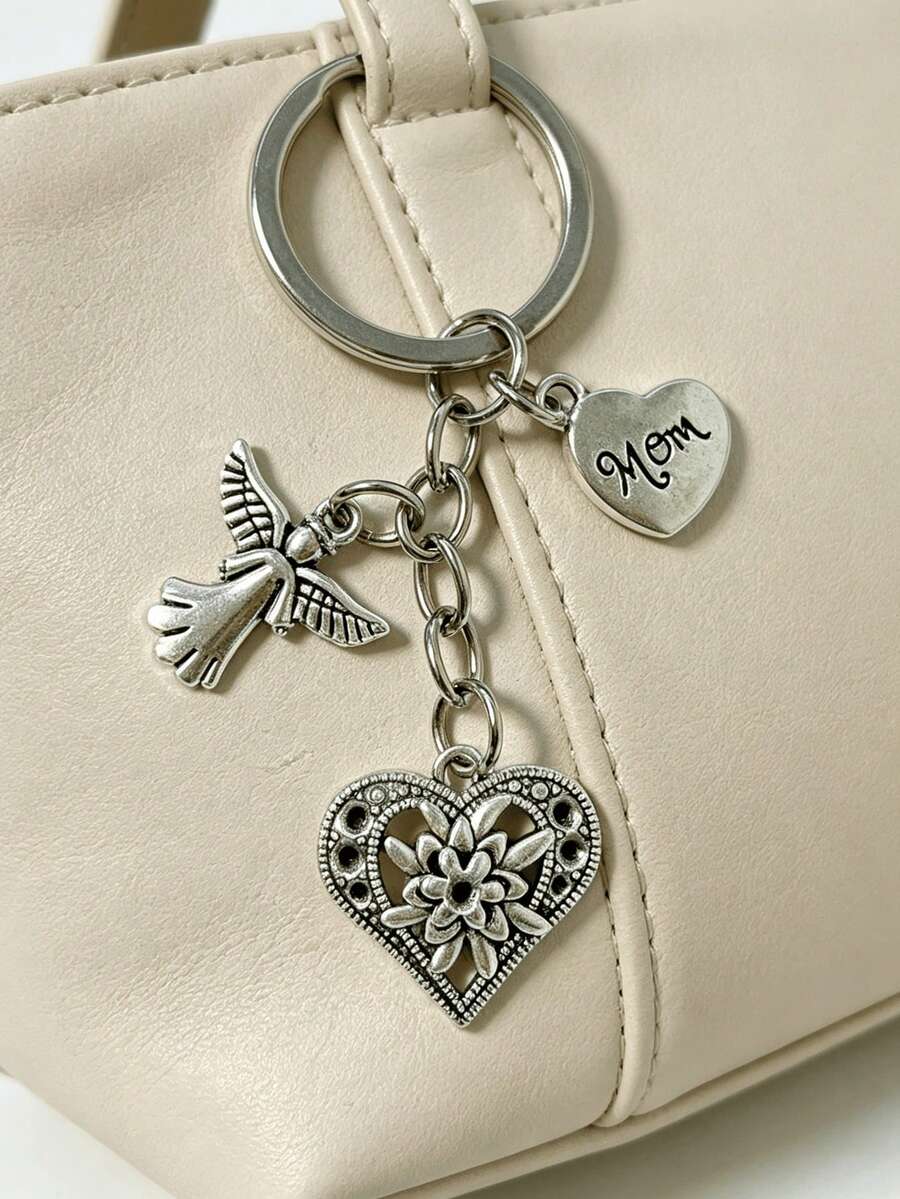 [1pc]Vintage Silver Mom Love Angel Key Chain, Hollow Flower Heart Bag Charm, Mother's Day Gift For Women, Engraved Mom Heart Flower Pendant, Warm Family Theme Handbag Accessory, Metal Key Ring, Portable Anti-Lost Key Holder, Daily Bag Decoration, Heartwarming Gift For Mom - Silver - View 1