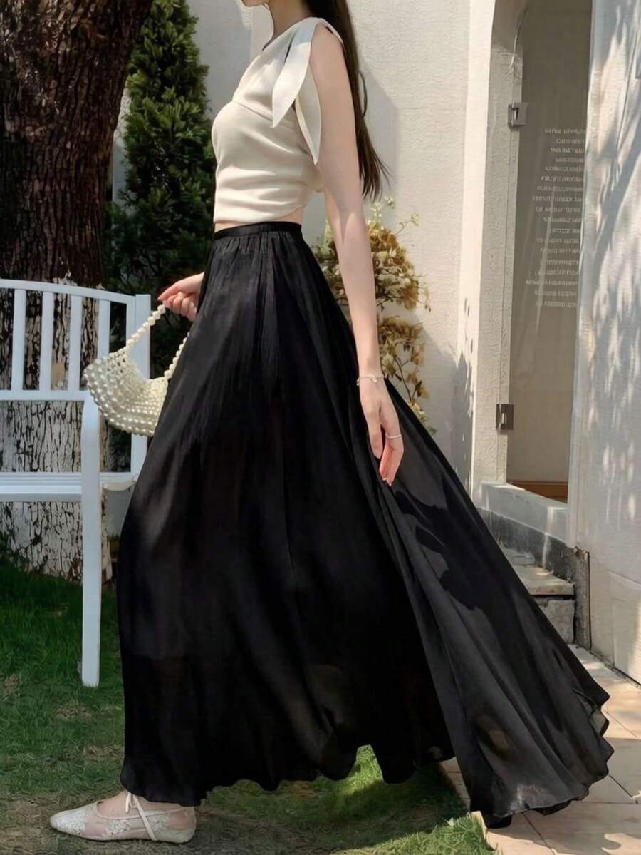 女款優雅飄逸長裙，梭織百褶A字長裙，無彈性，適合秋冬與夏季休閒與正式場合，黑色