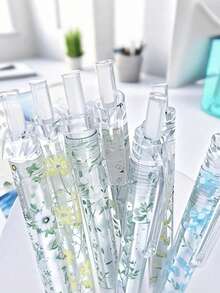 6 piezas de bolígrafos de gel retráctiles con patrón floral de 0.5mm de tinta negra de secado rápido, escritura suave para cuadernos y suministros de oficina, perfectos para la temporada de regreso a la escuela - flores - Ver 1