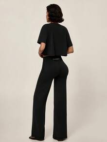 TimeOff Women's One Set Autumn/Winter Solid Color Round Neck Loose Short T-Shirt & Wide Leg Long Pants Sports Outfit - Black - View 8