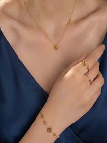 1 set Collier en acier de titane fleur de camélia + 1 bracelet + 2 bagues, ensemble de bijoux élégants fleur de camélia pour porter en couches collier, bague, bracelet - Doré - Voir 2