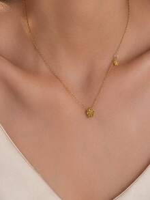 1 set Collier en acier de titane fleur de camélia + 1 bracelet + 2 bagues, ensemble de bijoux élégants fleur de camélia pour porter en couches collier, bague, bracelet - Doré - Voir 4