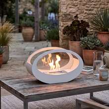 Metallischer Kleinkamin, Tischkamin mit biologischem Ethanol. Das elliptische Glas mit zwei Spalten wurde früher bei Gartenpartys verwendet. - Regulär - Übersicht 6