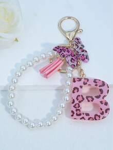 1件字母首字母鑰匙圈 雪花樹脂吊墜 女款包包掛飾 蝴蝶流蘇裝飾禮物 - 淺粉色 - 查看 15