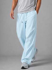 NcmRyu Men's Light Blue Crinkled Parachute Cargo Pants, Drawstring Waist Adjustable Hem Loose Fit Joggers, Suitable For Running And Streetwear - Baby Blue - View 1