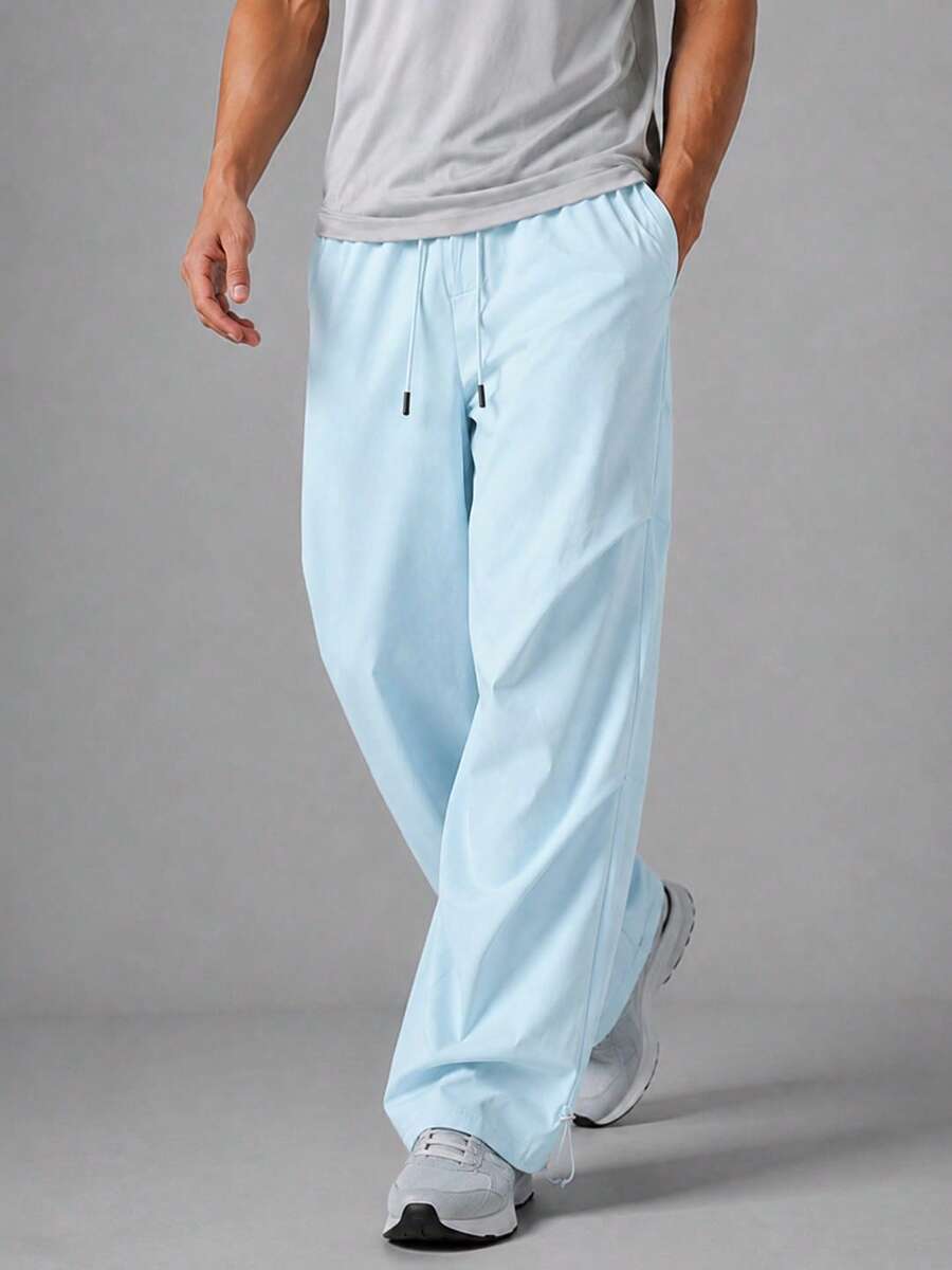 NcmRyu Men's Light Blue Crinkled Parachute Cargo Pants, Drawstring Waist Adjustable Hem Loose Fit Joggers, Suitable For Running And Streetwear - Baby Blue - View 1