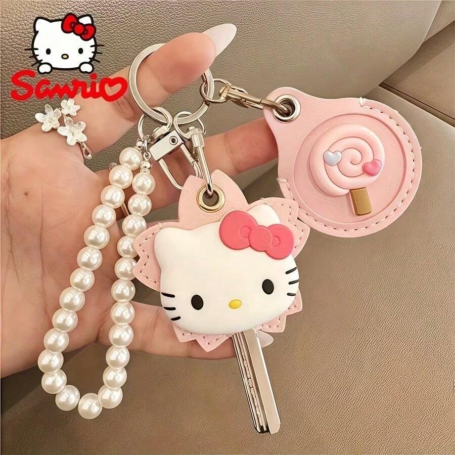 SANRIO Hello Kitty Key Cover & Card Protector dengan Rantai Mutiara. Desain yang imut dan fungsional, ideal untuk penggunaan sehari-hari dan sebagai hadiah menawan untuk penggemar Sanrio. - View 1