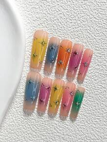 10片活力風手工穿戴甲，Polygel美甲套組，彩色水鑽與手繪星芒設計，藍色、粉色與黃色指甲油，包含美甲工具，3種尺寸可選，杏仁形、鴨嘴形、棺材形，適合派對、舞蹈、日常穿戴 - 彩色 - 查看 13