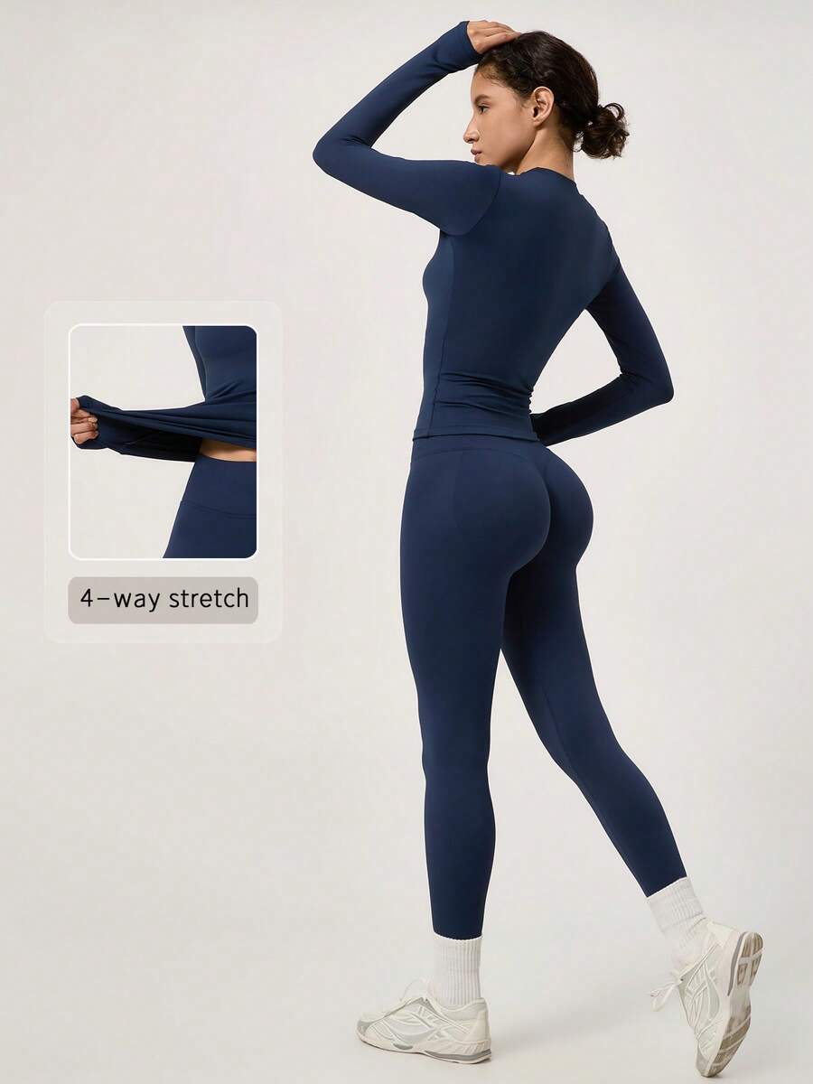 NcmRyu Women's One Set Solid Color Seamless Round Neck Short Sleeve Butt-Lifting Tight Cropped Pants Sports Outfit - Navy Blue - View 1