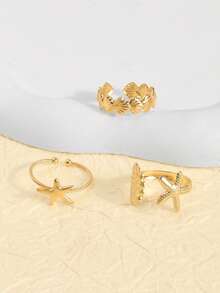1 Set de Anillos con Diseño de Estrella de Mar, Concha y Ventilador de Viento Oceánico - Dorado - Ver 5