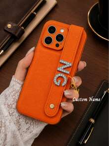 Customized Luxury Litchi Texture Rhinestone 3D Letter Phone Case, Personalized Letter Name, Minimalist Anti-Fingerprint Couple Leather Phone Case, Valentine's Day Gift, Good Birthday Gift, Holiday Gift, Gift For Him And Her, Personalized Gift - Orange - View 1