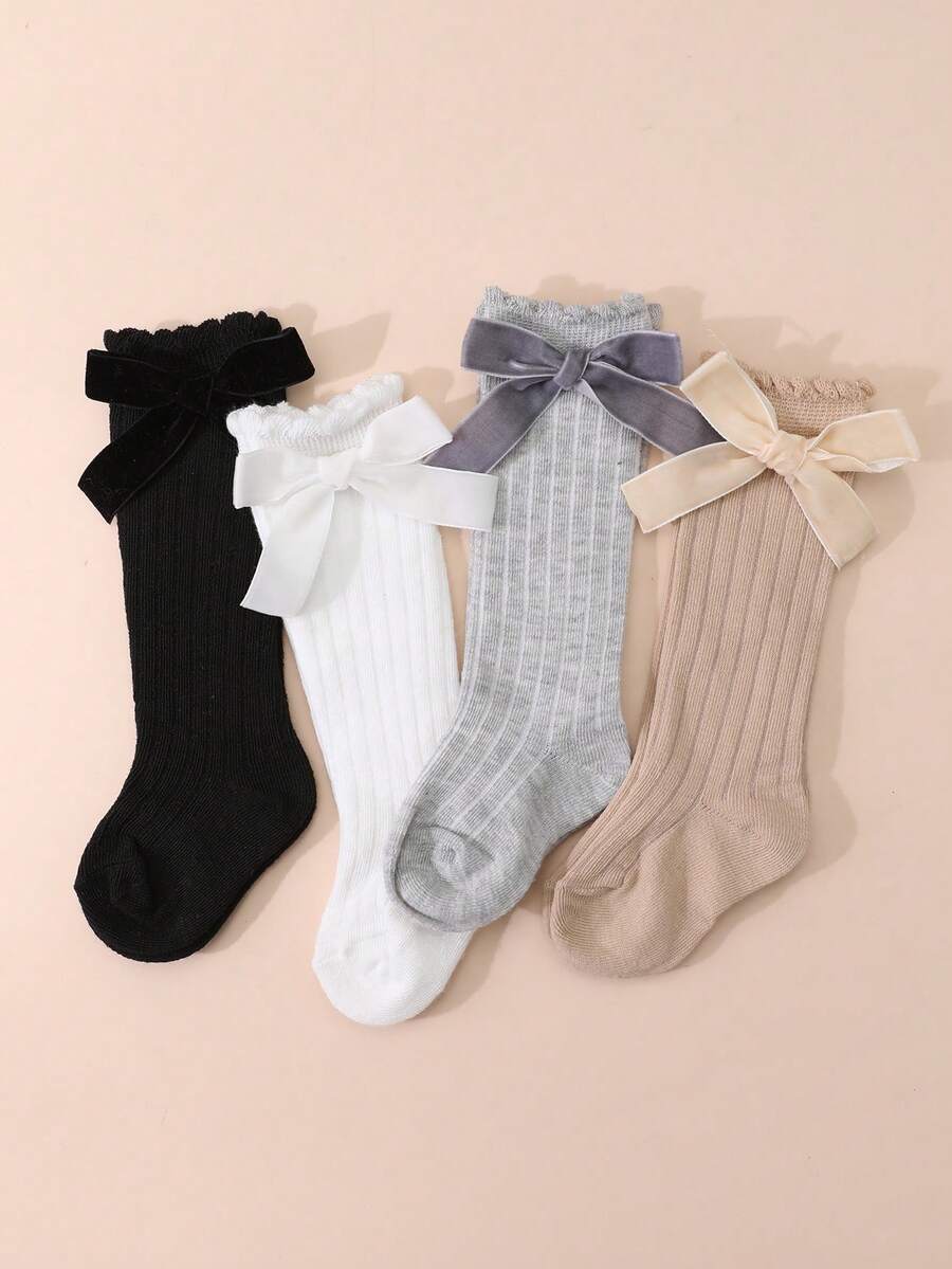 4雙甜美可愛純色蝴蝶結泡泡袖高筒襪，適合女嬰日常穿著