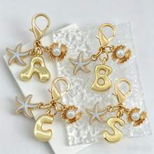 1pc Ocean Series Starfish Shell 26 Letters Keychain, Suitable For Bag Accessories, Lanyard With ID Holder, Car Decor, Bag Pendant, Couple Keychain, Perfect Gift For Vacation Season - Multicolor - View 6