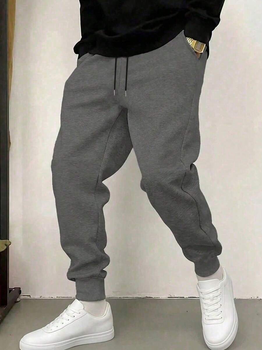 1件裝男士舒適寬鬆運動長褲，黑色運動褲，柔軟口袋，男友風設計，抽繩腰頭，適合四季穿著，休閒穿搭、放鬆與戶外活動，輕量運動褲適用於健身、跑步、健身房訓練等場景，100%聚酯纖維材質