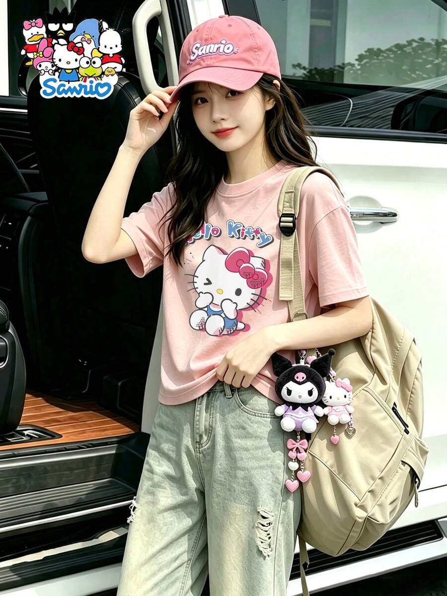 Rosa  Mädchen Kurzarmshirt mit zwinkerndem Hello Kitty Print, bunte "Hello Kitty" Schrift, lässiges Rundhals T-Shirt - Pink - Übersicht 1