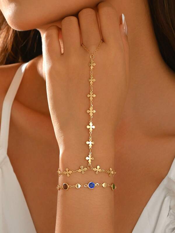 Bộ 2 vòng tay đeo ngón tay đính đá rhinestone nhiều màu thời trang đa năng, dạng chồng lớp kép, màu vàng, họa tiết cỏ bốn lá, trang sức tay nữ phổ biến, phù hợp đi du lịch, hẹn hò và đeo hằng ngày, sắp xếp màu đá ngẫu nhiên