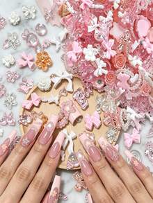 Aprox. 1100 piezas/100g de dijes mixtos para arte de uñas, estilo sexy con perlas, corazones, lazos y decoración de dibujos animados, accesorios de arte de uñas con flores, material de resina con forma de corazón de rosa, adecuado para joyería DIY, arte de uñas u otros accesorios decorativos, estilos aleatorios - aleatorio - Ver 11