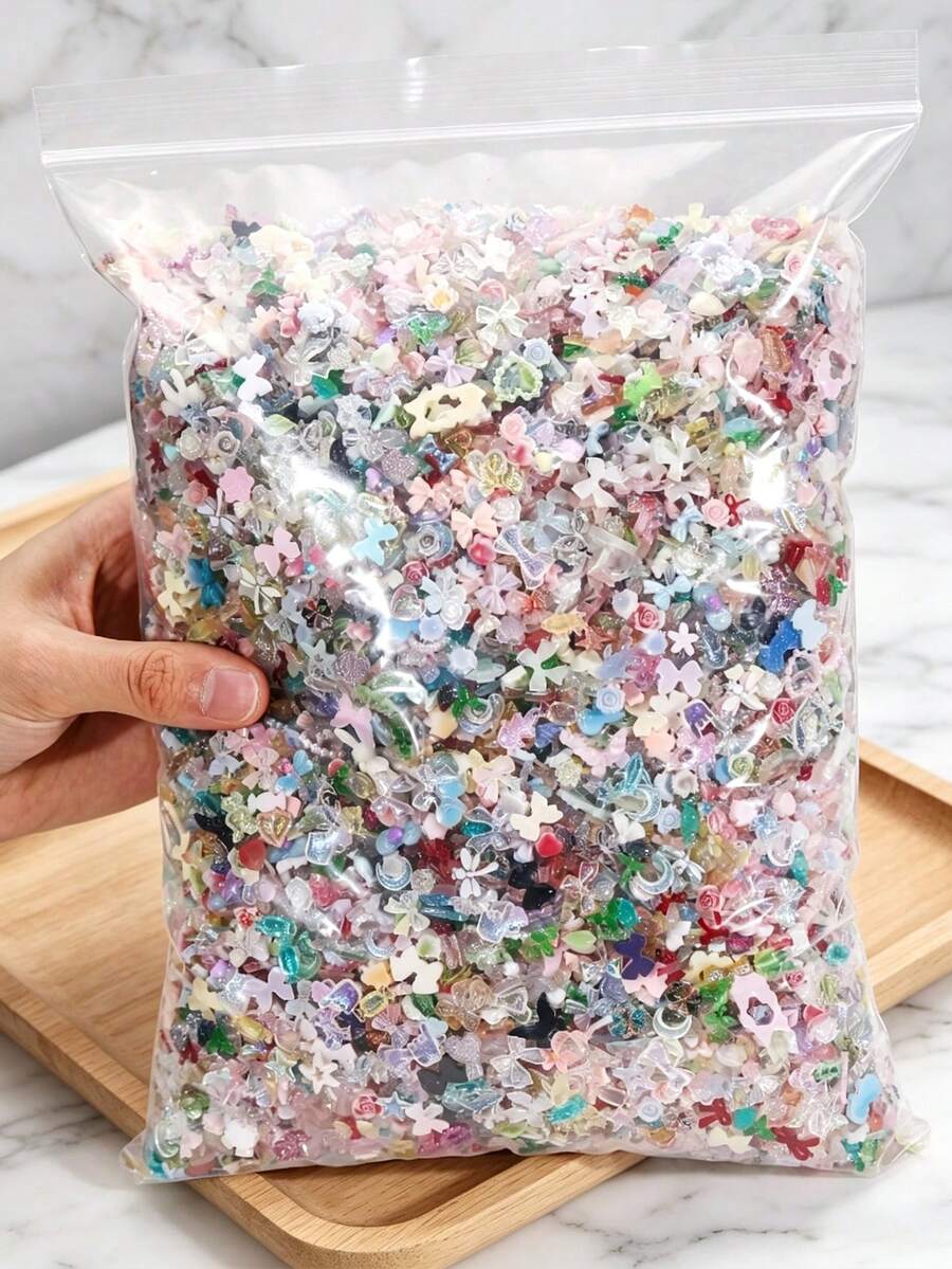 Aprox. 1100 piezas/100g de dijes mixtos para arte de uñas, estilo sexy con perlas, corazones, lazos y decoración de dibujos animados, accesorios de arte de uñas con flores, material de resina con forma de corazón de rosa, adecuado para joyería DIY, arte de uñas u otros accesorios decorativos, estilos aleatorios