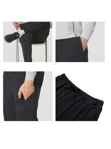 Under Armour Men's Sports Crop Cargo Pants, Knit Straight Leg Trousers For Daily Running, 1386979-001 - Black - View 9