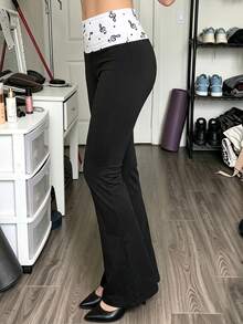 Fall Y2K Contrast Waist Flare Pants, Black Low Rise Bell Bottom Trousers With White Music Note Printed Fold Over Waistband, Slim Stretchy Casual Pants - Black - View 9