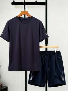 Herren Sommer Neu Dünn Marineblau 2 Stücke Lässig Sport Set, Rundhals Kurzarm T-Shirt + Lässig Sport Shorts, passende Blitz reflektierende Dekoration an Ärmeln und Shorts Beinen, Reißverschluss Tasche Diebstahlschutz - Königsblau - Übersicht 9