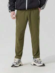 Adidas Men's Training Pants, Comfortable Breathable Fashion Knit Elastic Waist Mid-Rise Sport Trousers, Olive Green - Olive Green - View 1