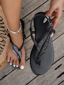 Sandalias de dedo con hojas de strass para mujer, chanclas planas con correa ajustable al tobillo, zapatos casuales de playa para el verano - Negro - Ver 1