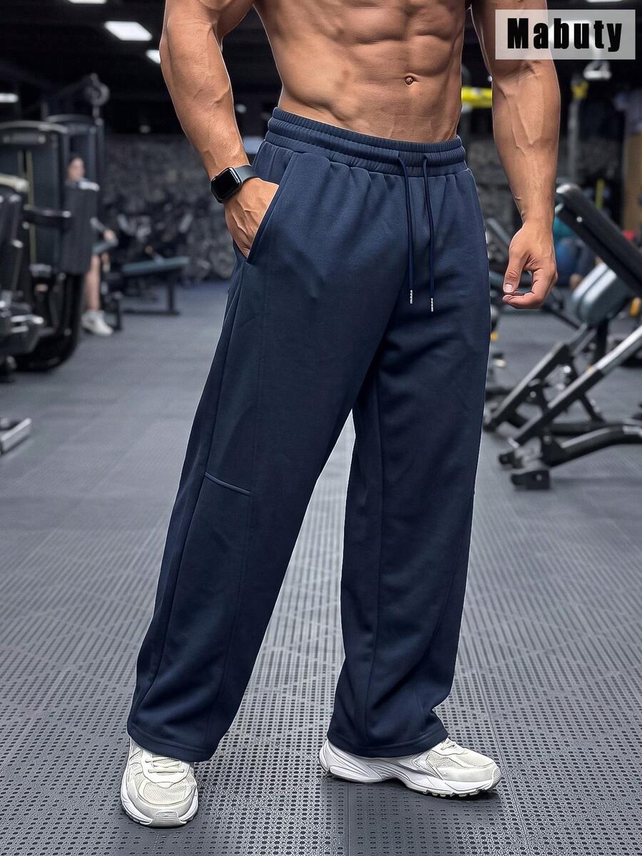 Celana Jogging Pria Mabuty Warna Navy dengan Potongan Lebar, Tali Serut, Jahitan Panel Longgar, dan Kantong Samping Dalam untuk Angkat Beban, Latihan di Gym & Olahraga. - Navy Blue - View 1