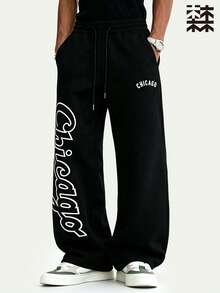 mulinsen Men's Elastic Waist Loose Straight Leg Wide Leg Pants, Black Base With Letter Print Heat Transfer Hip-Hop Style - Black - View 1