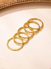 5 piezas Anillos apilables de banda fina minimalista de lujo chapados en oro de 18K de acero inoxidable, anillos de banda fina facetada 3D de acero de titanio que no se desvanecen para uso diario de niñas - Dorado - Ver 2