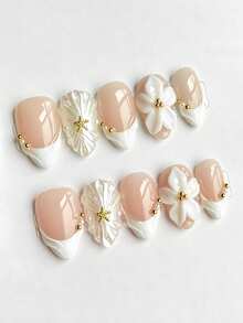 10 Peças Unhas Postiças de Amêndoa Feitas à Mão, Unhas Falsas com Ponta Francesa Nude e Branca, Flor de Plumeria Branca 3D, Concha, Estrela-do-Mar, Pérola Dourada, Conta, Folha em Relevo, Brilhante, Reutilizável, para Casamento na Praia, Manicure Elegante para Mulheres - Branco - Visão 2