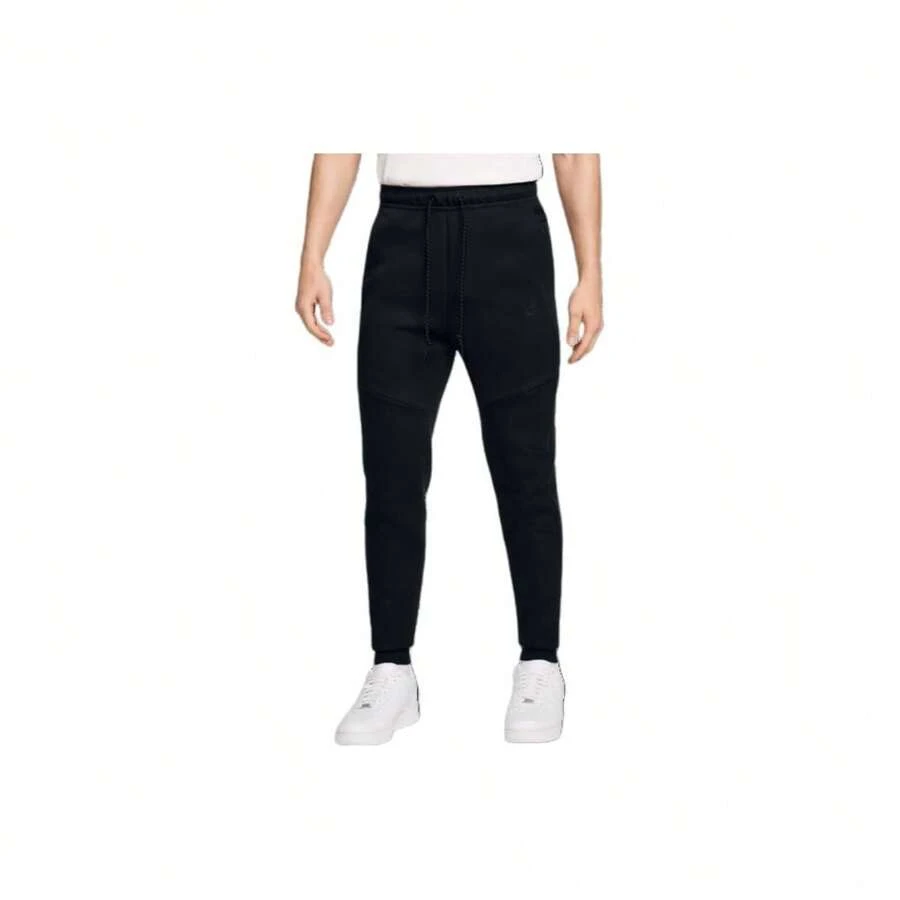 Pantalones deportivos de punto Nike de cintura media con cordones y puños, para hombre, color negro - Negro - Ver 1