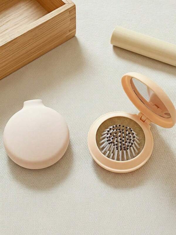 Madebyblanc 1 pièce Mini brosse à cheveux portable avec un peigne à coussin d'air pliable et un miroir. Facile à transporter pour le soin du corps, les voyages, l'extérieur, le sport, le bureau, l'école, les pinces à cheveux, les accessoires capillaires, les fournitures scolaires