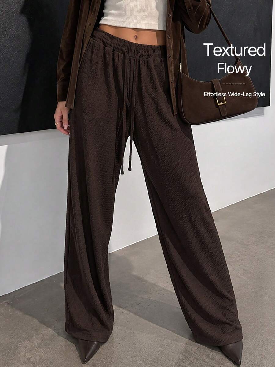 Women's Elegant Textured Wide Leg Pants, With Drawstring And Pockets, Fashionable Flowy Polyester Pants, Slightly Elastic - Brown - View 1