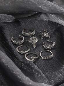 Juego de 8 anillos vintage desgastados de plata con cruz, mariposa, flor hueca con strass y estrella, anillos apilables para mujer - Plateado - Ver 4