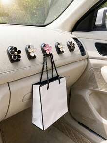 2 piezas de ganchos adhesivos mini para coche, ganchos de almacenamiento con forma de flor para el salpicadero y uso doméstico, adecuados para colgar bolsos, llaves y otros accesorios decorativos interiores - A - Ver 2